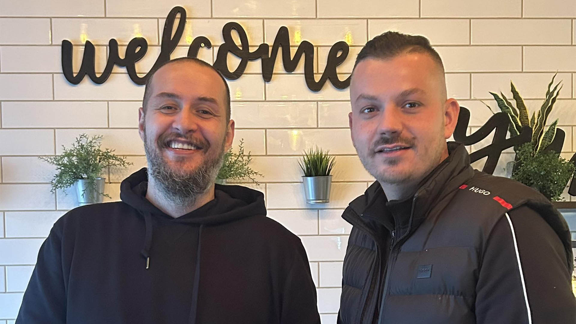 A photos of the owners of Mykonos Gyro in Mentor, Ohio.